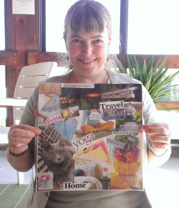 Me with my latest vision board, created in a workshop at Life Rocks in June.