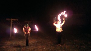 ElvenTiger (left) taught herself to spin poi, and now she lights her props on fire...